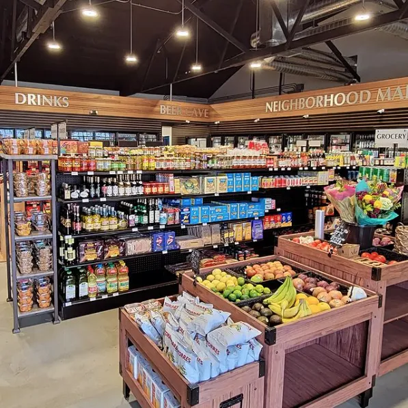 The interior of the Napa Food City Market with shelves of groceries and food.